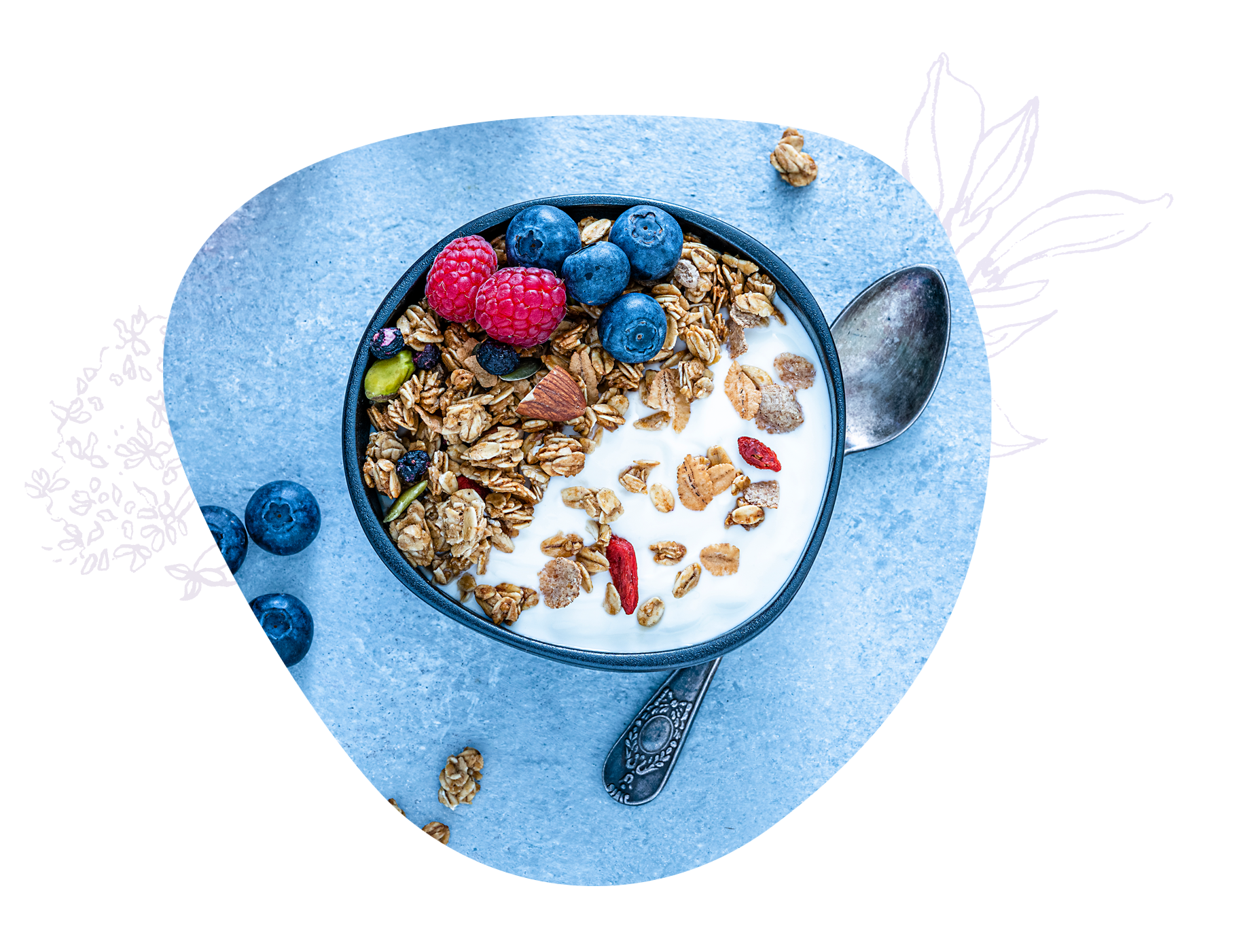 Frühstücksschale mit Müsli, Beeren und Milch